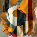 Orange geometric-pattern waffle-knit pullover sweater with button placket and long sleeves
