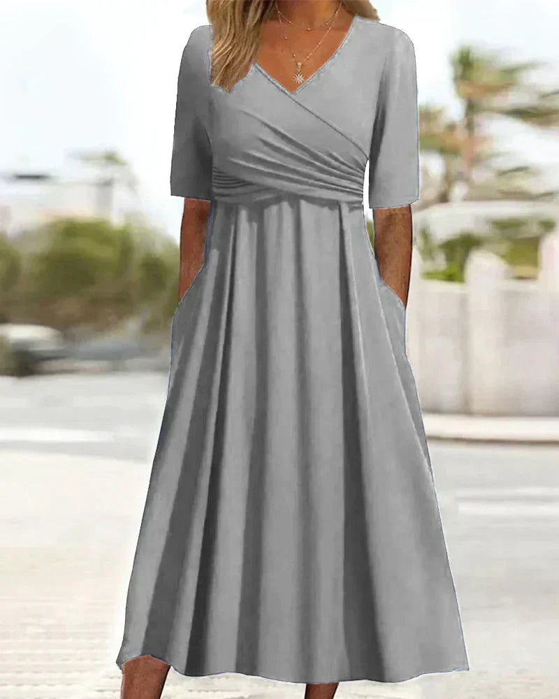 Gray crossover short-sleeve dress with V-neck and gathered waist, midi length