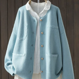 Light blue button-front cardigan sweater with stand collar, front pockets, ribbed cuffs