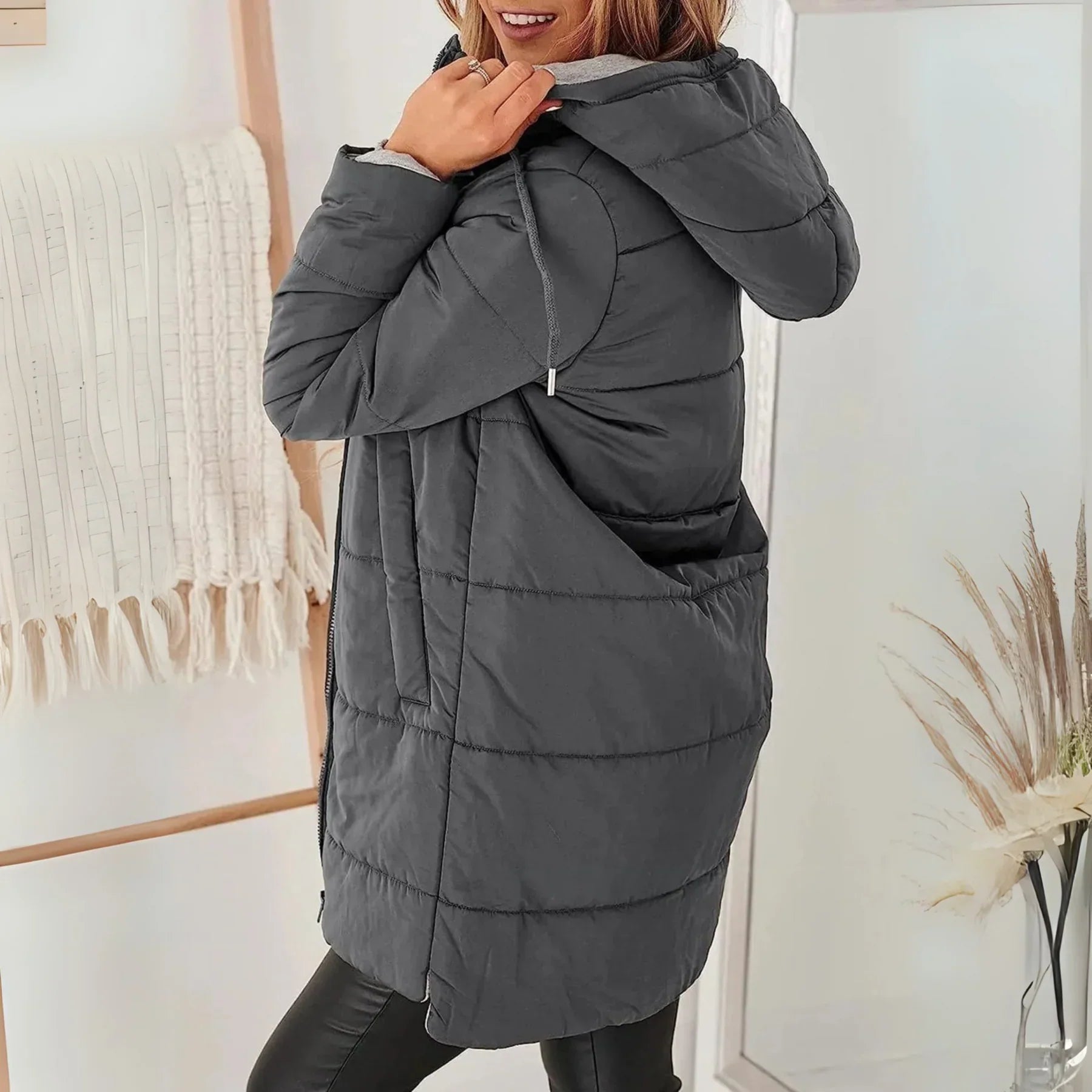 Charcoal gray hooded puffer down jacket with front zipper and side pockets