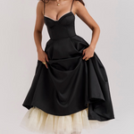Women's black fitted bodice slimming dress with flared skirt and tulle hem