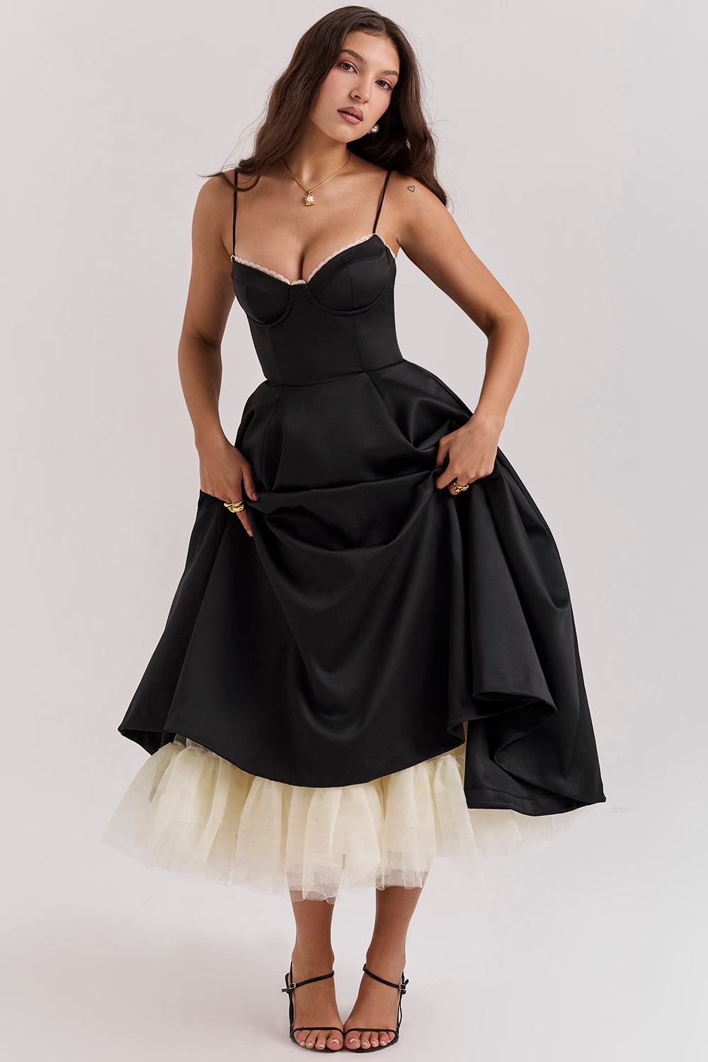Women's black fitted bodice slimming dress with flared skirt and tulle hem