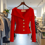 Red ribbed knit button-front top with long sleeves and peplum hem