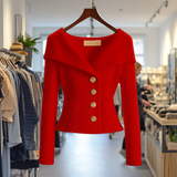 Red ribbed knit button-front top with long sleeves and peplum hem