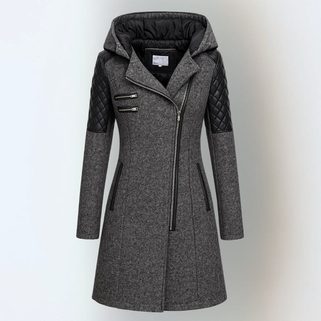 Women’s winter parka coat in dark gray with black quilted sleeves, zip front, hood.