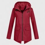 Red hooded zip-up jacket with drawstring, front pockets, and buttoned flap closures