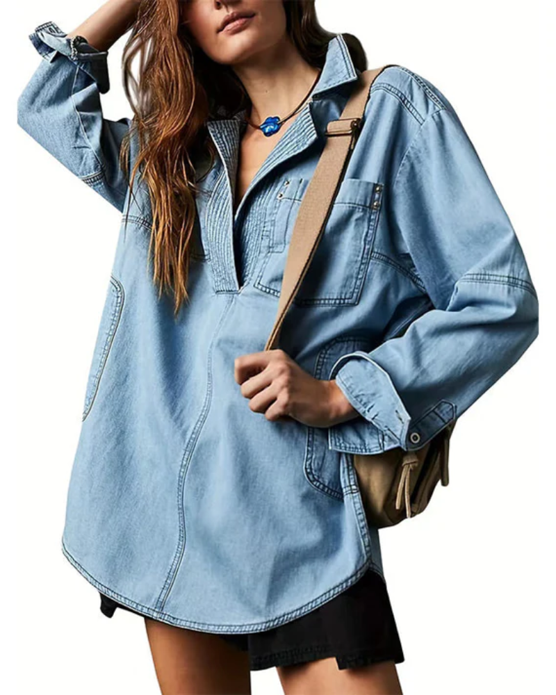 Light blue oversized denim pullover with half-zip collar and front pocket