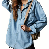 Light blue oversized denim pullover with half-zip collar and front pocket