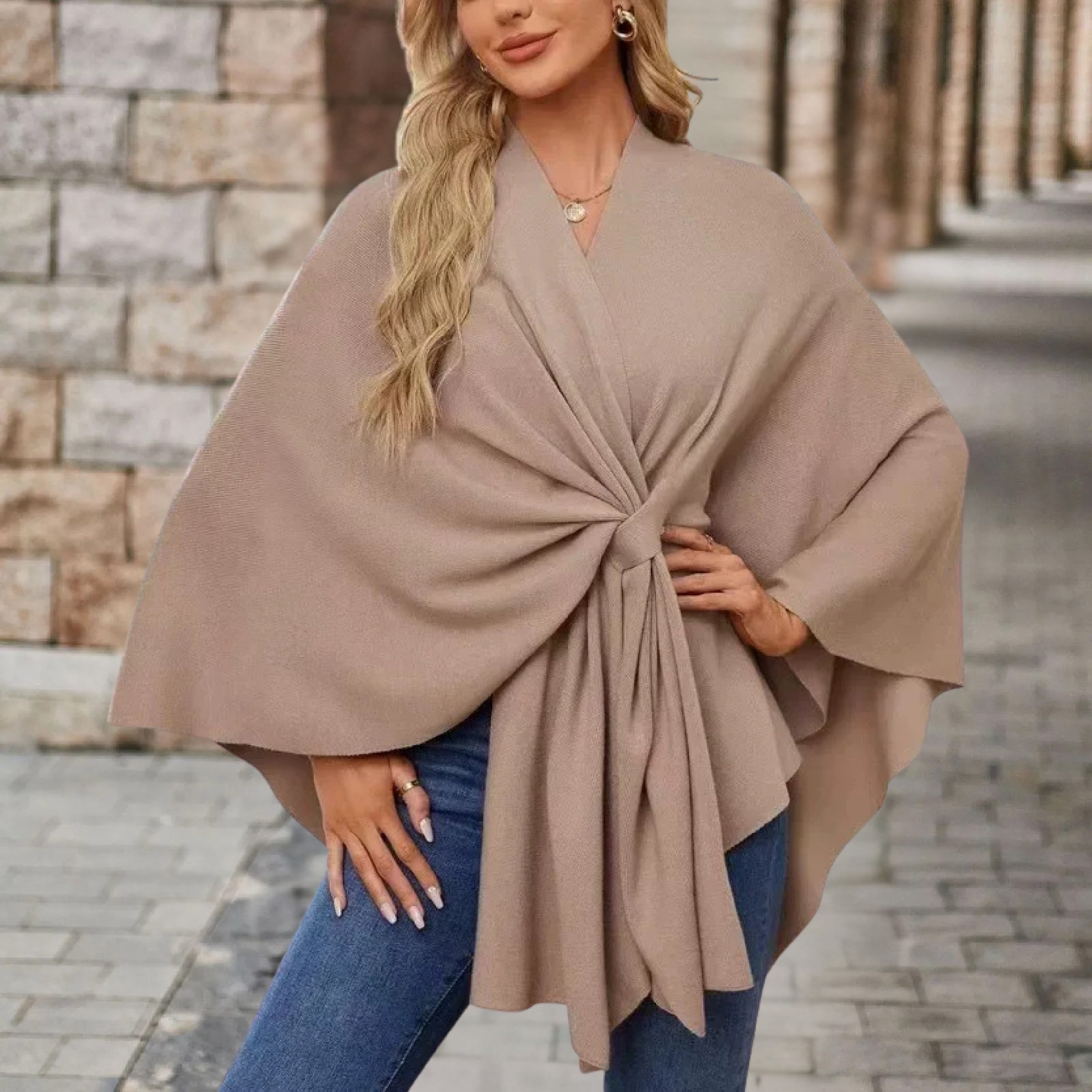 Taupe draped poncho with V-neck and gathered front knot, wide cape sleeves