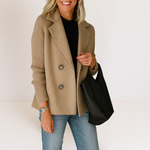 Beige everyday blazer with notch lapels and four-button front, ribbed knit sleeves