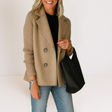 Beige everyday blazer with notch lapels and four-button front, ribbed knit sleeves