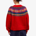 Back view pullover sweater in red knit with multicolor Fair Isle yoke and ribbed cuffs
