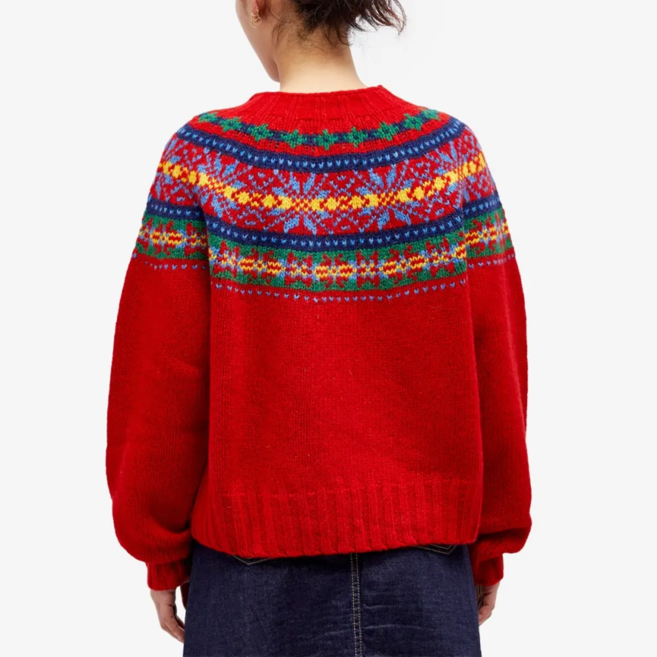 Back view pullover sweater in red knit with multicolor Fair Isle yoke and ribbed cuffs