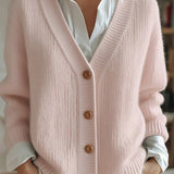 Pink knit V-neck cardigan with button front and ribbed cuffs, long sleeves