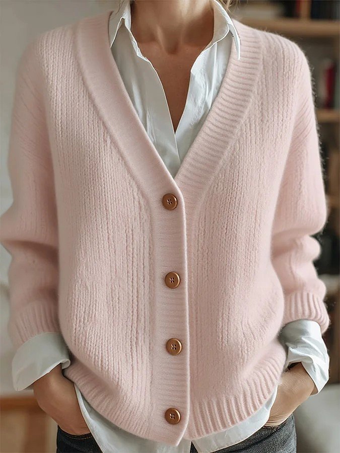 Pink knit V-neck cardigan with button front and ribbed cuffs, long sleeves