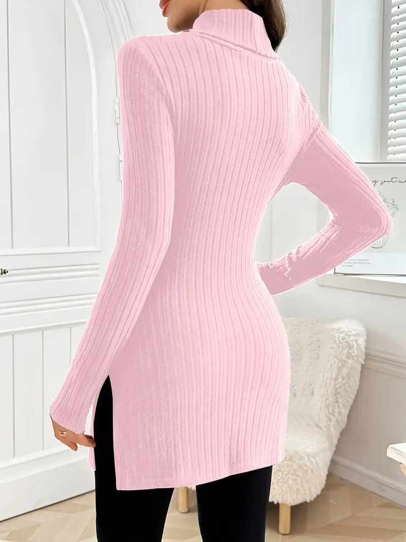 Ribbed knit turtleneck sweater in light pink, fitted long sleeves with side slit