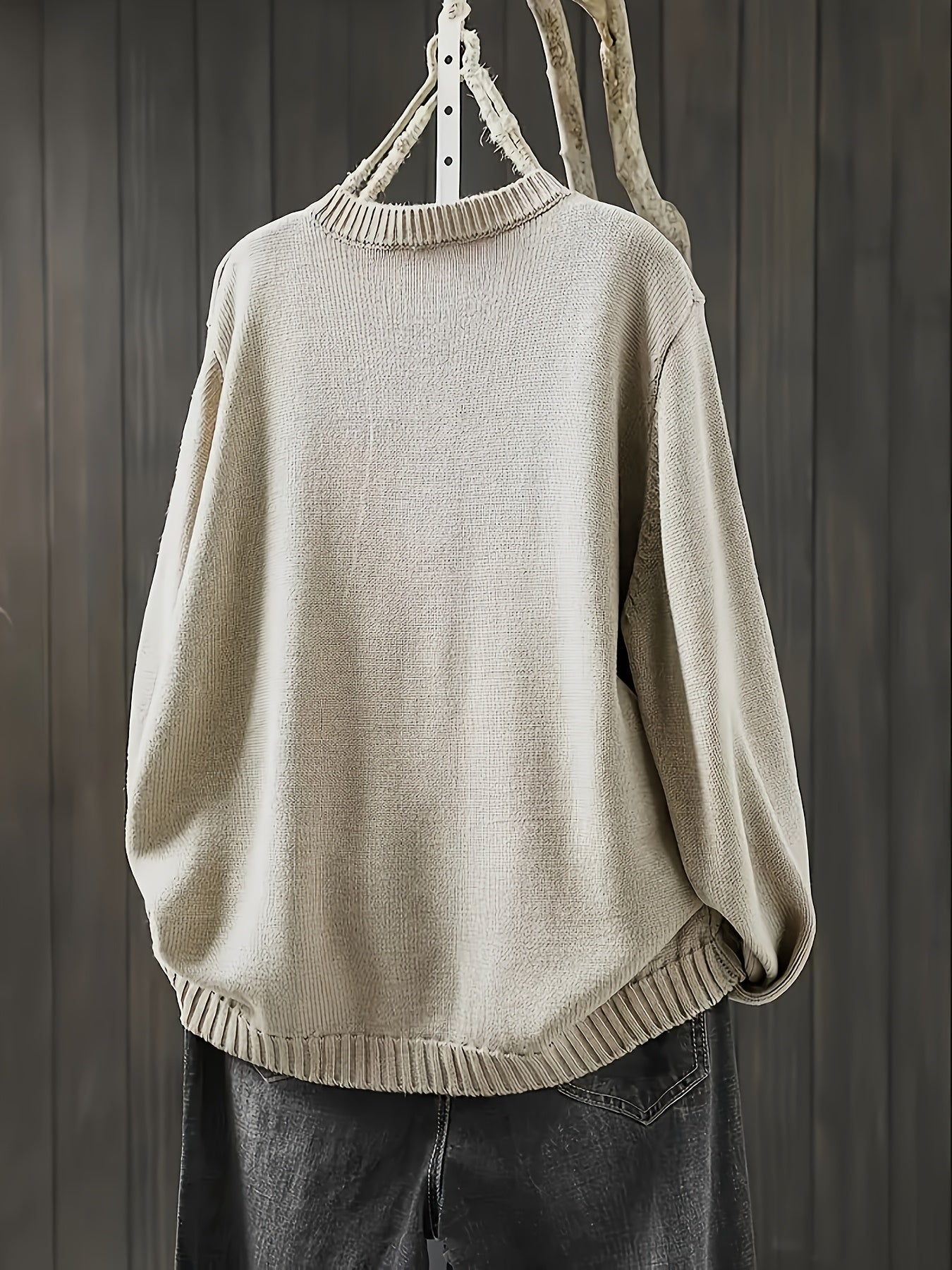 Beige cardigan sweater, long sleeves with ribbed collar, cuffs, and hem