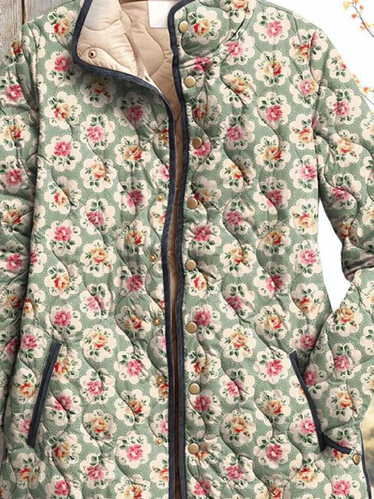 Floral hooded vintage jacket close-up with button placket and beige hood lining