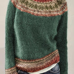 Womens green knit pullover with crew neck, long sleeves, multicolor patterned yoke and hem trim
