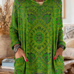 Vintage-inspired hooded knit tunic with front pockets, green multicolor ethnic print