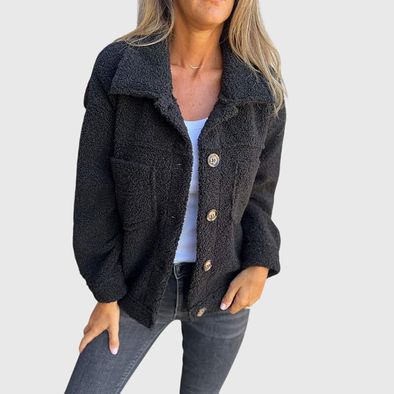 Black sherpa jacket with button front and flap pockets