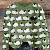 Festive knit sweater with green base and white cloud cow print, crew neck, long sleeves