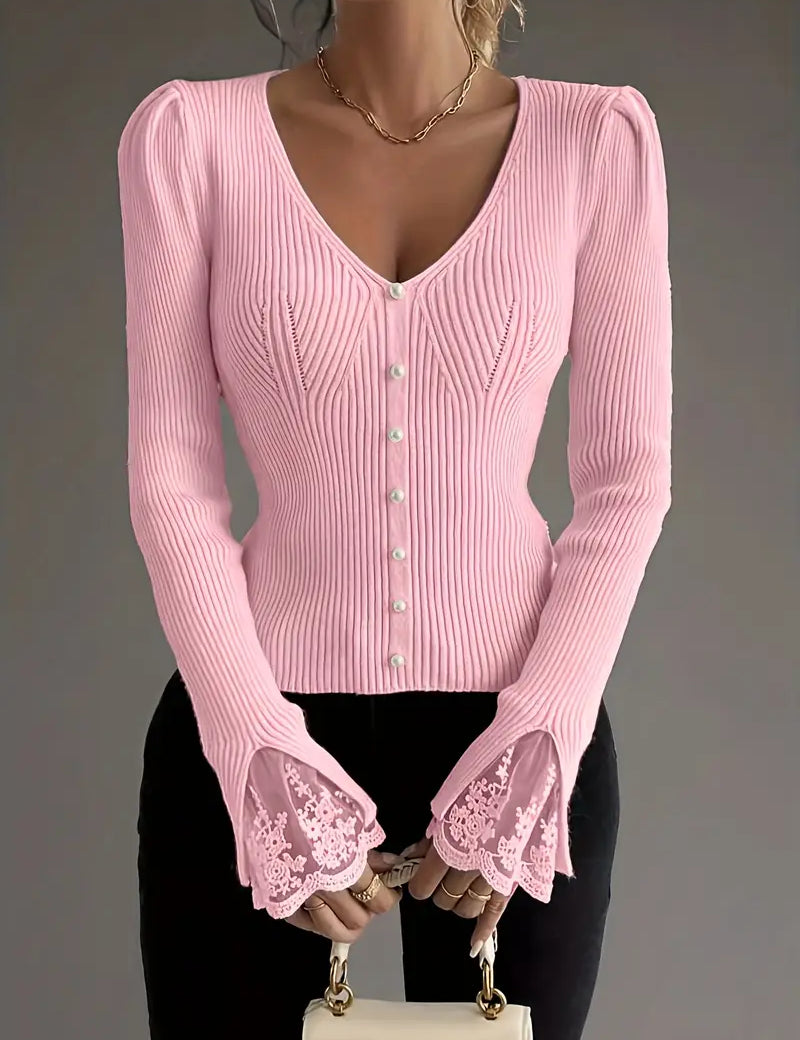 Pink ribbed V-neck top with button front and lace-trim bell cuffs