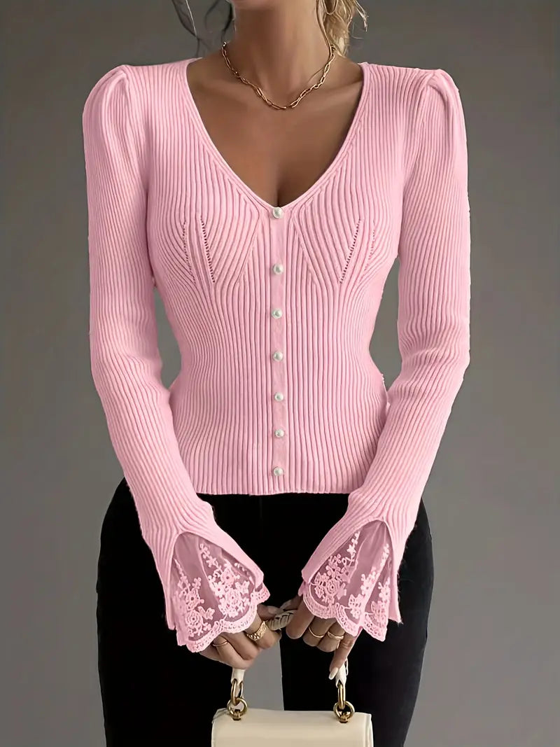Pink ribbed V-neck top with button front and lace-trim bell cuffs