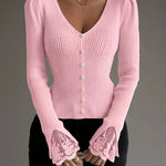 Pink ribbed V-neck top with button front and lace-trim bell cuffs