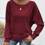 Burgundy striped knit pullover with batwing sleeves and ribbed cuffs, relaxed fit