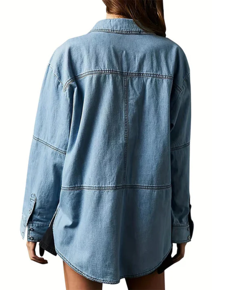 Light blue oversized denim pullover, back view, dropped shoulder and curved hem