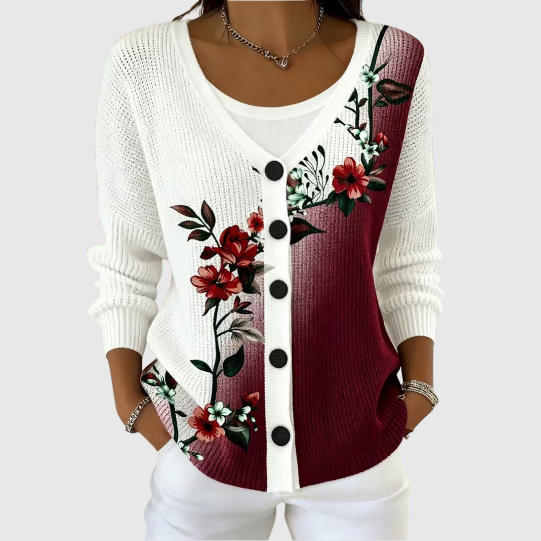 White knit cardigan with button front and burgundy floral embroidery, ribbed cuffs