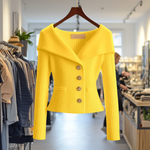 Yellow ribbed knit button-front top with long sleeves and peplum hem