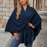 Navy draped poncho with V-neck and gathered front knot, wide cape sleeves