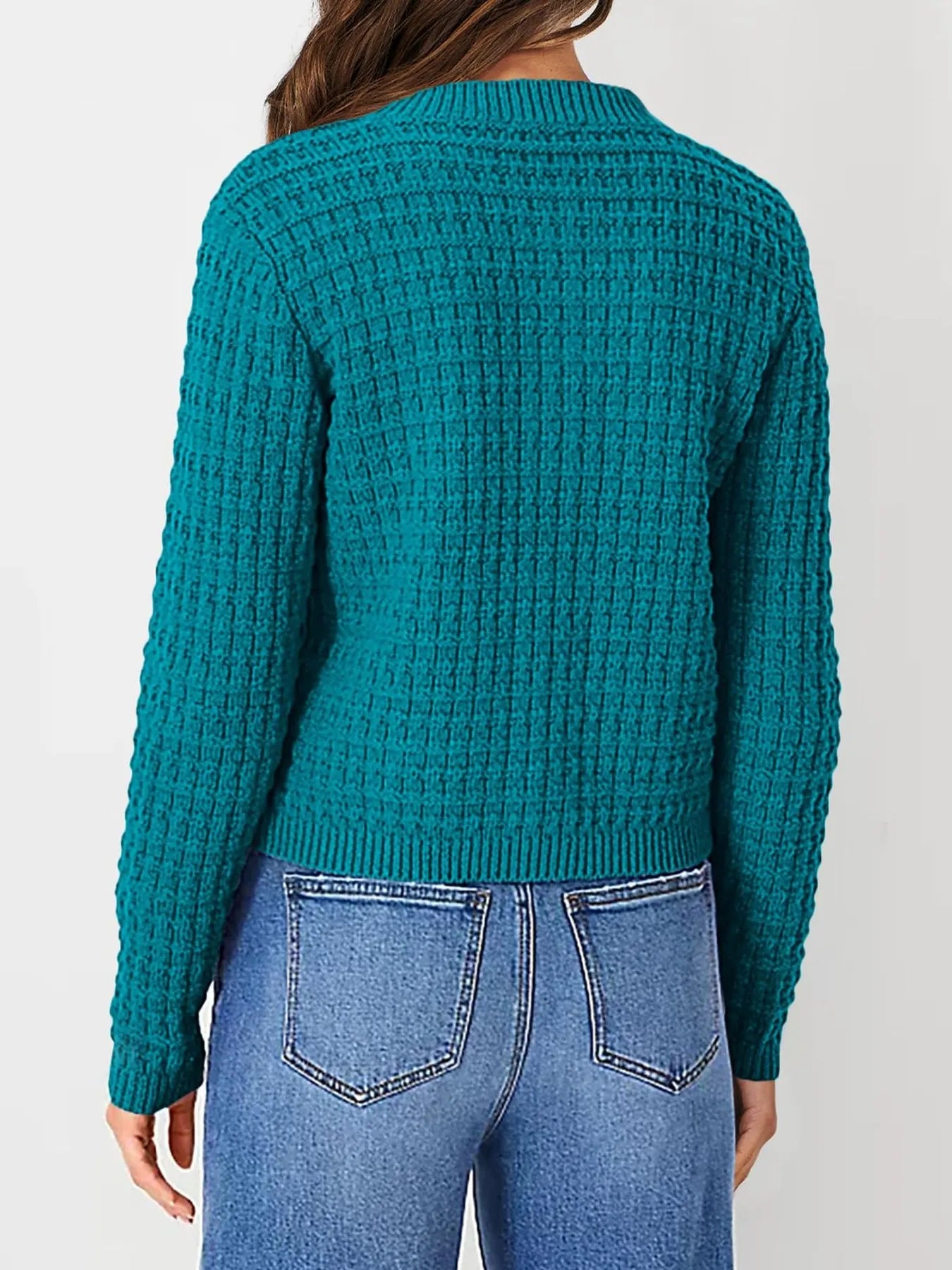 Teal knit cardigan back view with textured stitch pattern and ribbed hem