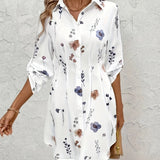 White floral button-front dress with collar and long sleeves