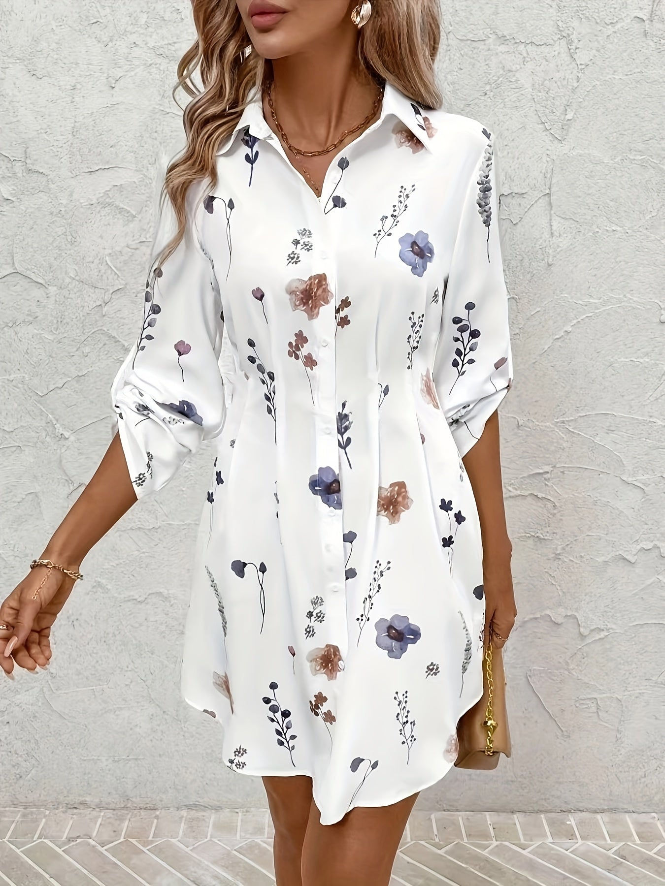 White floral button-front dress with collar and long sleeves