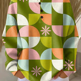 Abstract-pattern pullover with multicolor geometric print, round neck, button-front, long sleeves