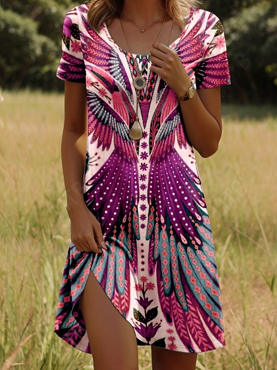 Bohemian print dress with short sleeves, pink base with circular dotted details and floral touches