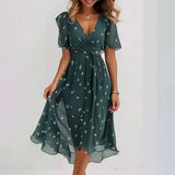 Knee-length dark green floral wrap dress with short sleeves and ruched tied waist