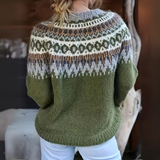 Green fair isle knit pullover with crew neck, long sleeves and ribbed hem