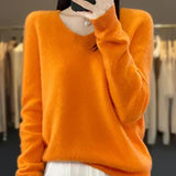 Soft knit sweater in bright orange, long sleeves, crew neckline