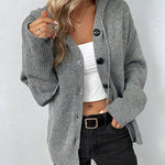Gray hooded button-front knit pullover with long sleeves and ribbed cuffs
