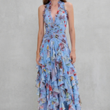 Blue floral halter maxi dress with braided tie waist detail and cascading ruffle tiers