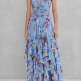 Blue floral halter maxi dress with ruched waist and layered ruffle skirt