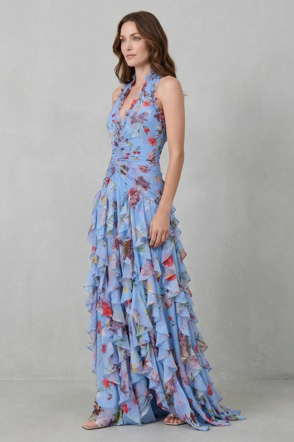 Blue floral halter maxi dress with side tiered ruffles and cinched waist