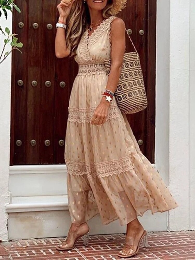 Beige boho maxi dress close-up, lace-trim bodice and tiered tulle skirt