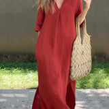 Red casual shirt dress, V-neck with short sleeves and front buttons, side slits