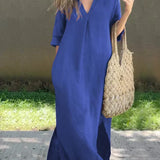 Blue casual shirt dress, V-neck, three-quarter sleeves, relaxed midi length with side slit