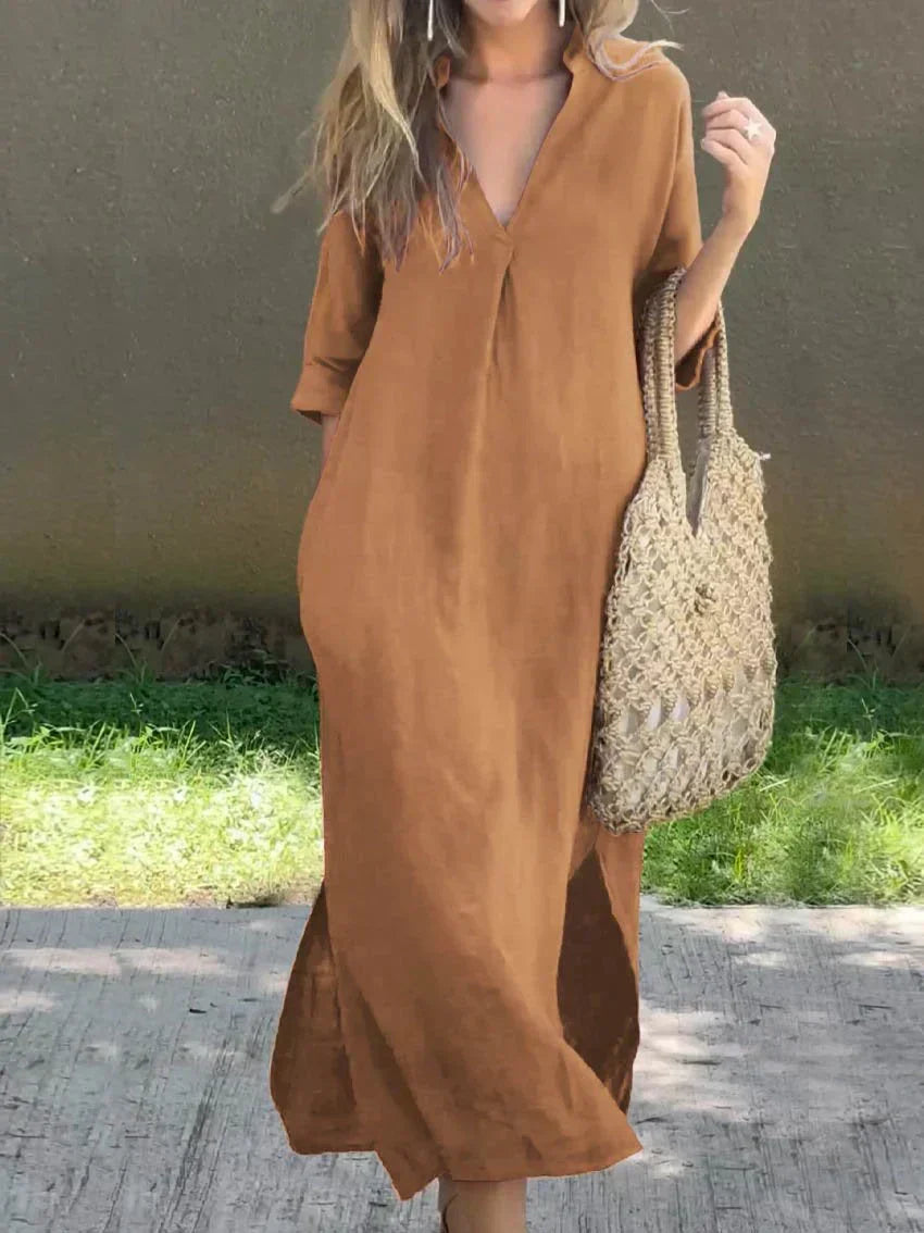 Brown casual shirt dress, V-neck, three-quarter sleeves, relaxed midi length with side slit